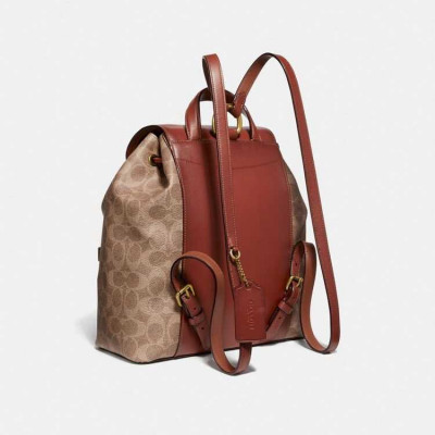 Evie Backpack In Signature Canvas - Tan/Rust/Brass