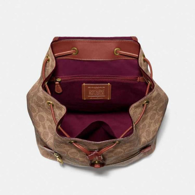 Evie Backpack In Signature Canvas - Tan/Rust/Brass